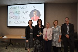 Emeritus Professor Maree Gleeson (centre), CCRI Director Professor Nick Goodwin (right) and CCLHD Research Manager Dr Katherine Bolton (left) with Maree Gleeson Award for Excellence in Research recipient Dr Jennie King (middle left) and Emerging Researcher recipient Jacqueline Jagger (middle right)